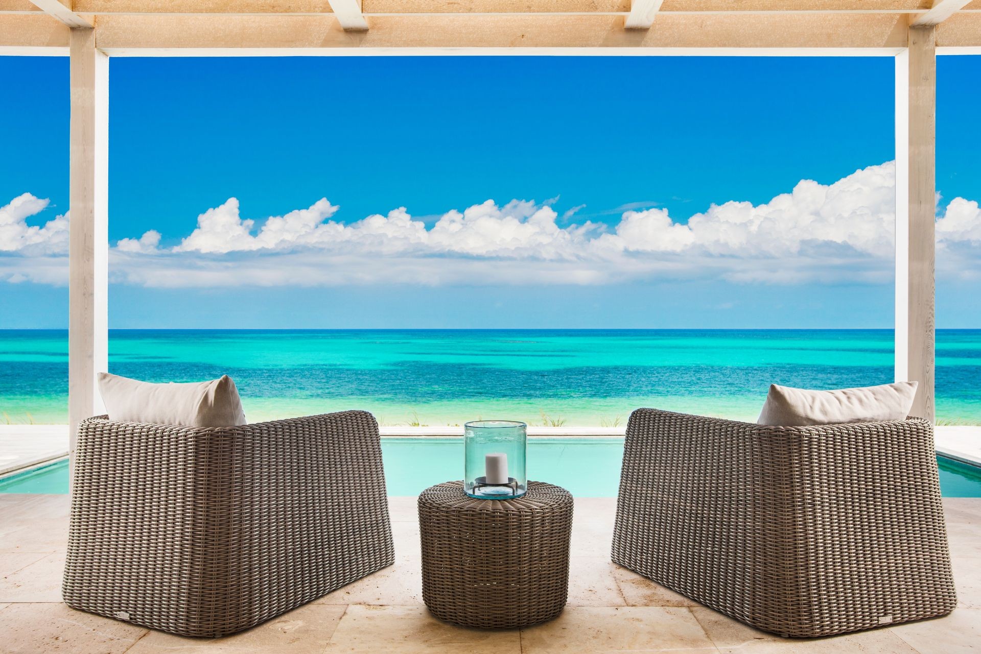 Luxury oceanfront view at Sailrock Resort in Turks and Caicos - serene beach, turquoise waters, and elegant accommodations